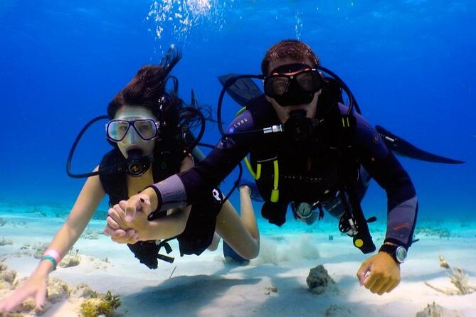 3 Semporna Islands Tour with Snorkel or Diving Experience - Mataking: lunch, beach time, and another swim