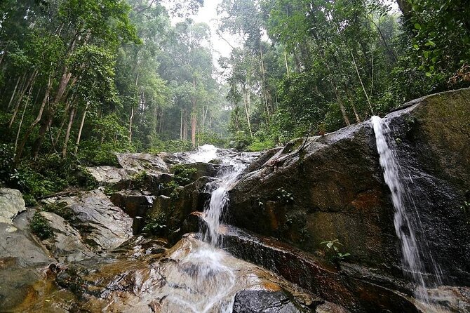 Countryside Tour Waterfall, Hot Springs & Batu Caves With Lunch - Batik Chong gives you a quick look at textile work
