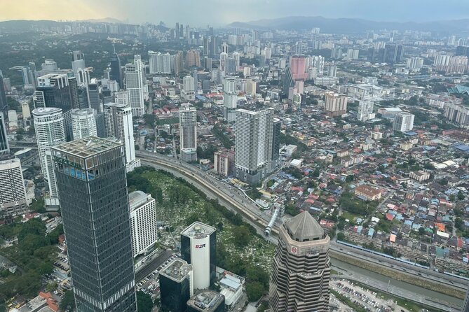 Kuala Lumpur City Tour with Petronas Twin Tower Admission Ticket - The National Textiles Museum and old railway architecture
