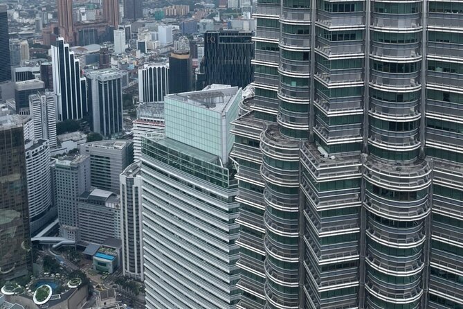 Kuala Lumpur Full Day City Tour with Petronas Twin Tower Tickets - Markets, temples, and the city’s neighborhoods