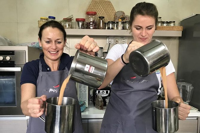 New Malaysian Kitchen Cooking Class and Garden Tour - Start with flower tea and a garden walk