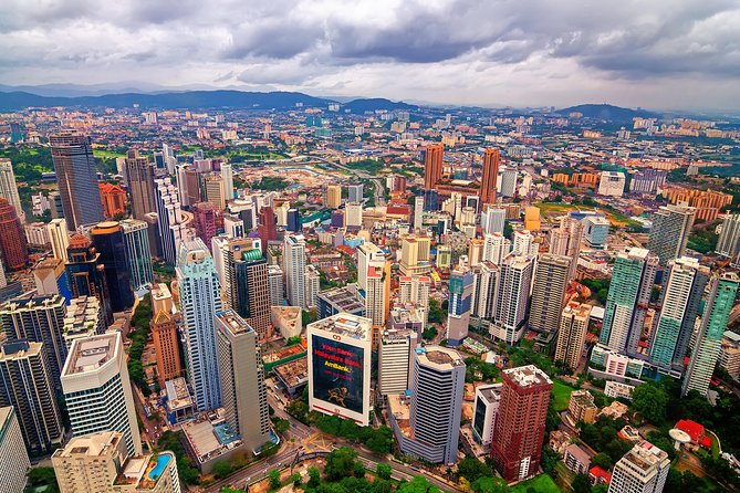 Petronas Twin Towers Skybridge and Kuala Lumpur City Tour - King’s Palace and the old railway station