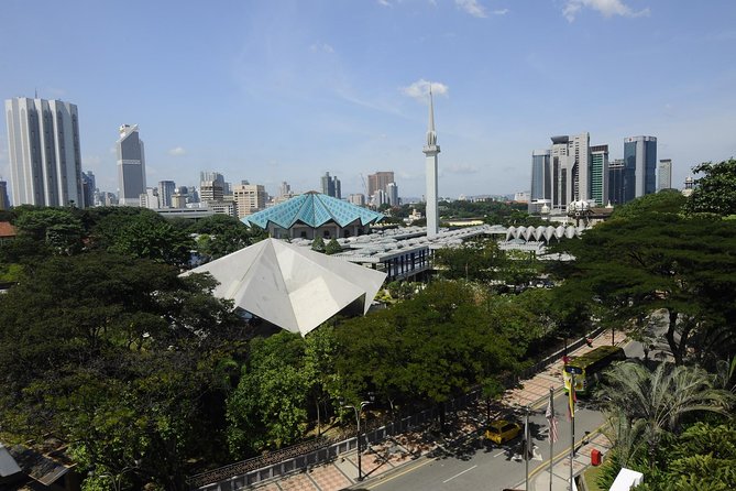 Private Half-Day Kuala Lumpur Culture And Communities Exploration Tour - Chinatown: food, shops, and a busy central district