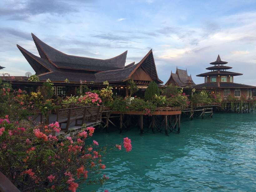 Semporna: Mabul and Kapalai Trip in Snorkel or Dive & Lunch - Mabul’s water village and resort views